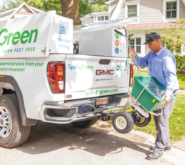 springgreen lawncare professional unloading supplies from springgreen branded truck