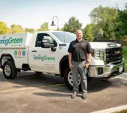 SpringGreen franchise owner Rob Leiner standing in front of SpringGreen truck