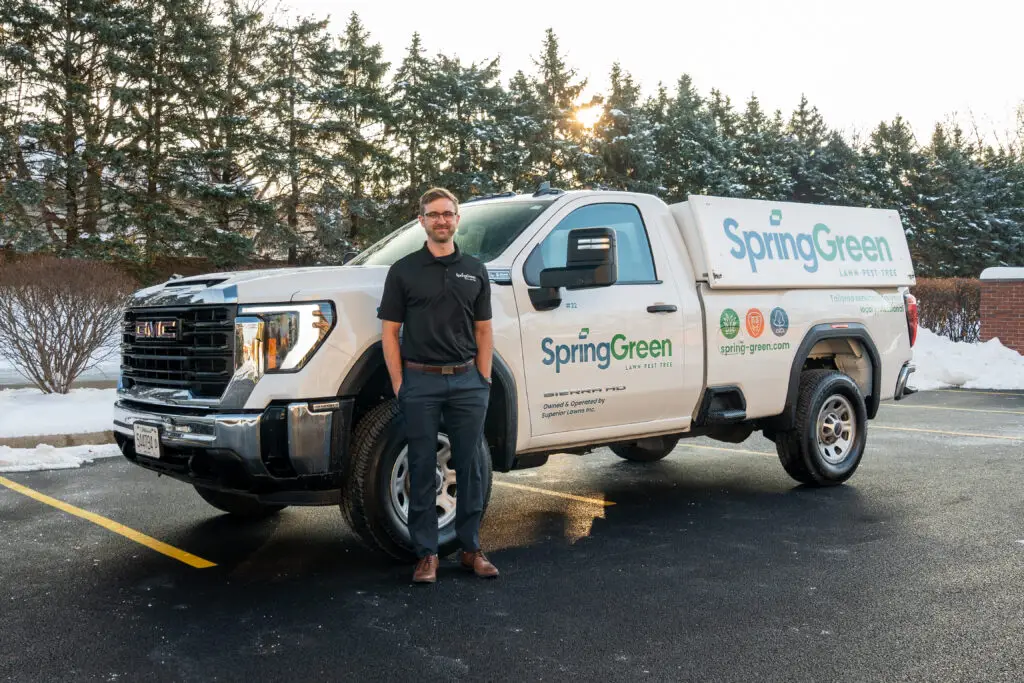 SpringGreen franchise owner Jeremy McDaniel standing in front of SpringGreen truck