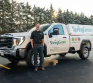 SpringGreen franchise owner Jeremy McDaniel standing in front of SpringGreen truck