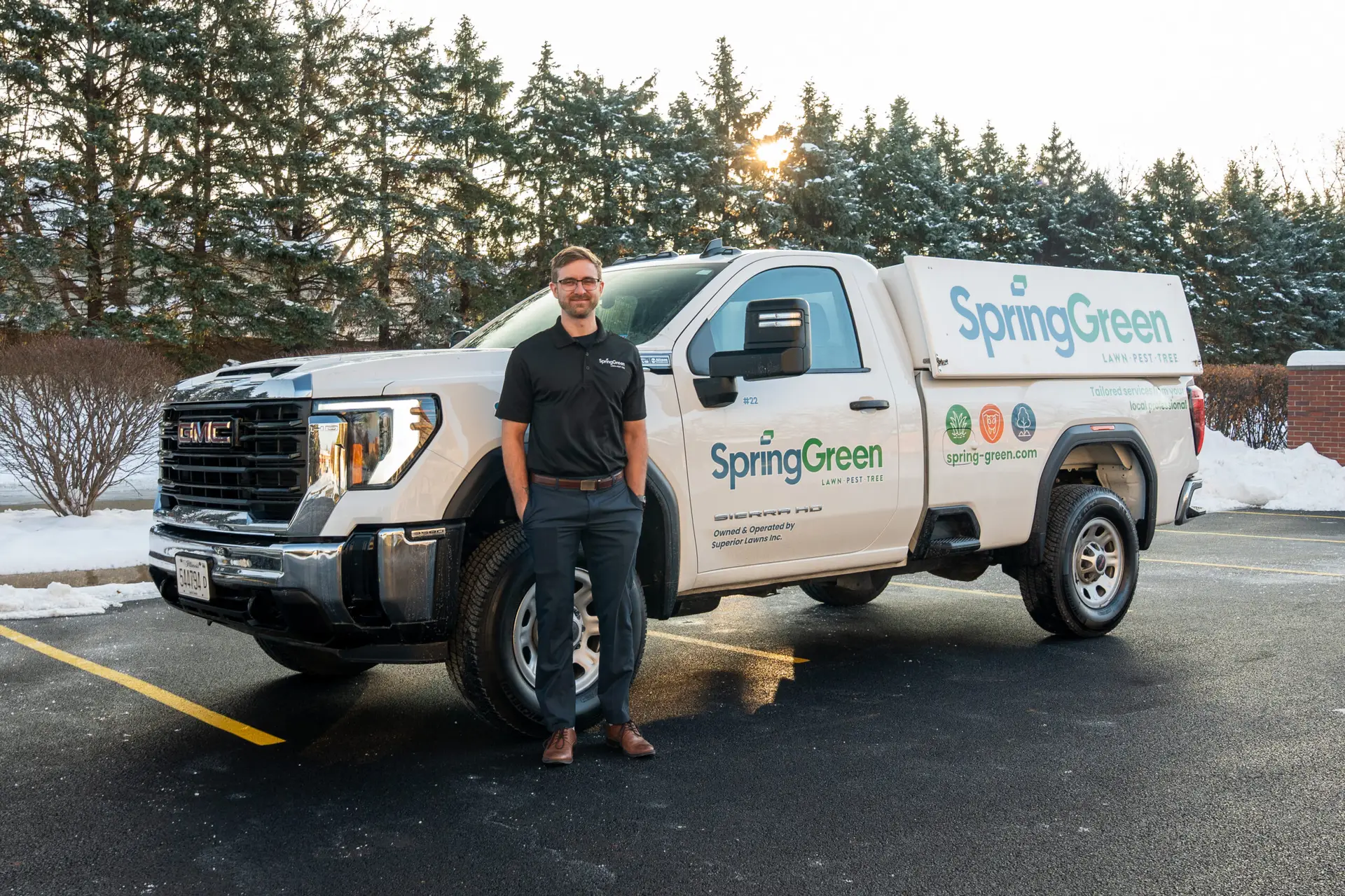 SpringGreen franchise owner Jeremy McDaniel standing in front of SpringGreen truck