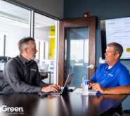 SpringGreen consultant talking to client in conference room