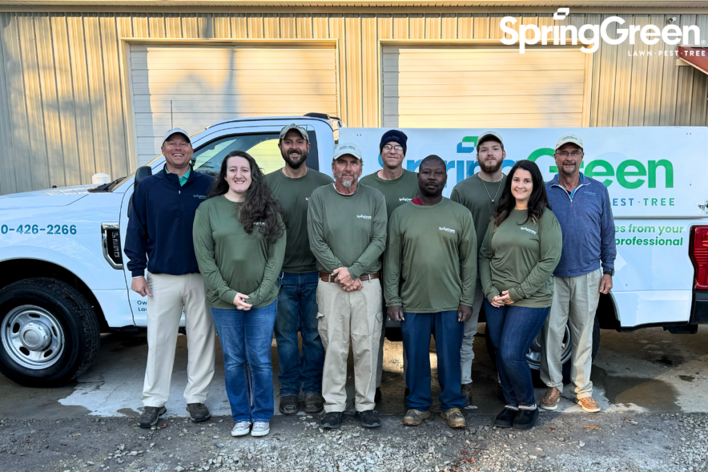 SpringGreen team standing infront of SpringGreen truck