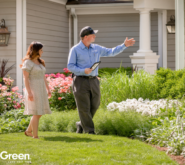 SpringGreen employee talking to customer outside