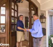 SpringGreen employee talking to homeowner at front door